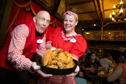Disney World Serves 900 Pounds of Fried Chicken and 30 Gallons of Baked Beans a Night at This 50-Year-Old Dinner Show
